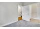 Cozy bedroom providing access to hallway, bathroom and a staircase at 1285 W 9Th Ave, Denver, CO 80204