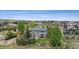 Aerial view of home showing landscaping, back yard, and neighborhood at 5334 Sedona Dr, Parker, CO 80134