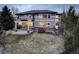 Home featuring an outdoor living space with fire pit, pergola, and landscaped yard at 5334 Sedona Dr, Parker, CO 80134