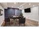 Finished basement featuring a poker table, TV, and wainscoting detail at 5334 Sedona Dr, Parker, CO 80134