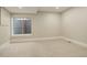 Bright basement with neutral carpet, window well, and recessed lighting at 5334 Sedona Dr, Parker, CO 80134