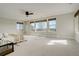 Spacious bedroom with neutral colors, large windows, and distant views at 5334 Sedona Dr, Parker, CO 80134