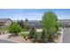 Beautifully landscaped residence features a stone and siding exterior with a well-manicured front yard at 5334 Sedona Dr, Parker, CO 80134