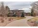 Lovely multi-story home featuring a two-car garage, meticulous landscaping, and a curved driveway at 5334 Sedona Dr, Parker, CO 80134