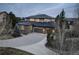 Beautiful two-story home featuring a three-car garage and expansive driveway at 5334 Sedona Dr, Parker, CO 80134