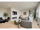 Modern living room features a sleek fireplace, comfortable seating, and stylish decor accents at 5334 Sedona Dr, Parker, CO 80134