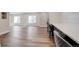 Finished basement with a counter, seating, white walls, and wood-look floors at 5334 Sedona Dr, Parker, CO 80134
