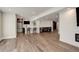 Finished basement with a bar, recessed lights, and wood-look floors at 5334 Sedona Dr, Parker, CO 80134