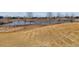 Picturesque community park features a pond, a small bridge and grassy hills at 12014 E Mexico Ave, Aurora, CO 80012