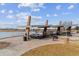 Community park featuring covered picnic tables near the water and landscaped surroundings at 12014 E Mexico Ave, Aurora, CO 80012