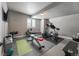 This finished basement has an exercise area with workout equipment at 21916 E Swallow Pl, Aurora, CO 80016