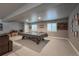 This finished basement includes a covered pool table and a dart board at 21916 E Swallow Pl, Aurora, CO 80016