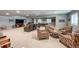 This finished basement features a media area with a large television at 21916 E Swallow Pl, Aurora, CO 80016