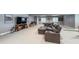 This finished basement features a large television and a seating area at 21916 E Swallow Pl, Aurora, CO 80016