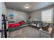 This is a bedroom with two twin beds and a crib for children at 21916 E Swallow Pl, Aurora, CO 80016