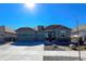 Well-maintained home featuring a three-car garage and a beautifully landscaped yard at 21916 E Swallow Pl, Aurora, CO 80016