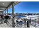 Covered porch includes seating, dining area and views of the neighborhood at 21916 E Swallow Pl, Aurora, CO 80016