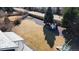 Aerial shot of large backyard with shed, trees and well manicured lawn at 7404 La Quinta Ln, Lone Tree, CO 80124