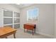Bright bedroom featuring an expansive window, and sliding door closet at 7404 La Quinta Ln, Lone Tree, CO 80124