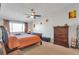 Main bedroom with ceiling fan and plenty of closet space at 660 S Alton Way # 10D, Denver, CO 80247