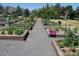 The property has a community garden with graveled walkways at 660 S Alton Way # 10D, Denver, CO 80247