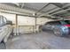 Spacious garage with multiple cars and built-in storage solutions for organized parking and storage at 660 S Alton Way # 10D, Denver, CO 80247