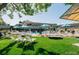 The property has a community pool with a large lawn area for residents at 660 S Alton Way # 10D, Denver, CO 80247