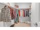 Large walk-in closet with ample hanging space and shelving at 660 S Alton Way # 10D, Denver, CO 80247
