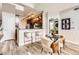 Stylish kitchen with breakfast bar, modern lighting, and adjacent dining area at 9019 E Panorama Cir # D504, Englewood, CO 80112