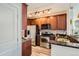 Modern kitchen with stainless steel appliances and sleek countertops at 9019 E Panorama Cir # D504, Englewood, CO 80112