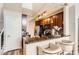 Stylish kitchen featuring granite countertops, modern appliances, and pendant lighting at 9019 E Panorama Cir # D504, Englewood, CO 80112