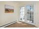 Bedroom features access to private balcony with double doors and bright natural light at 3580 Broadway St # 3, Boulder, CO 80304