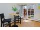 Cozy dining area with easy access to the private back deck, creating a perfect indoor/outdoor flow at 3580 Broadway St # 3, Boulder, CO 80304