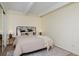 This main bedroom features a bed with neutral tones and a view of the closet at 3580 Broadway St # 3, Boulder, CO 80304