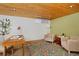Office with wood ceiling, desk, neutral chairs, and colorful rug at 3580 Broadway St # 3, Boulder, CO 80304