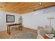 Office featuring wood ceiling, desk, neutral chairs, and colorful rug at 3580 Broadway St # 3, Boulder, CO 80304