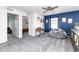 Bonus room with large grey beanbag chair and grey carpet at 3412 Valentia St, Denver, CO 80238