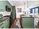 Spacious kitchen with an open floor plan at 3412 Valentia St, Denver, CO 80238