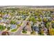 Aerial view of a home in a neighborhood with mature trees at 106 Cherry St, Castle Rock, CO 80104