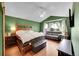 Spacious bedroom with a window and hardwood flooring at 106 Cherry St, Castle Rock, CO 80104