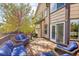 Outdoor deck with comfortable blue patio furniture perfect for entertaining at 106 Cherry St, Castle Rock, CO 80104
