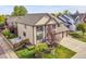 Stunning home exterior with manicured front yard and two-car garage at 106 Cherry St, Castle Rock, CO 80104