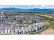 Scenic aerial view of the neighborhood with snow-capped mountains in the distance at 12374 Farmview St, Thornton, CO 80241