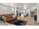 Spacious open-concept room featuring the living area and kitchen at 12374 Farmview St, Thornton, CO 80241