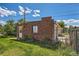 Brick outbuilding with potential for various uses, such as a workshop or storage space at 2361 Olive St, Denver, CO 80207