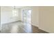 Bright dining room with laminate floors and sliding glass doors to a deck area at 462 Chelan St, Golden, CO 80401