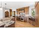 Gourmet kitchen featuring custom wood cabinets, stone countertops, and stainless steel appliances at 6634 Window Rock Ln, Morrison, CO 80465