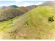 Scenic hillside with a hiking trail and native vegetation in a mountain community at 6634 Window Rock Ln, Morrison, CO 80465
