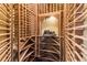 Custom wine cellar with wooden racks, perfect for wine storage and display at 6634 Window Rock Ln, Morrison, CO 80465