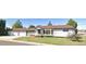 Charming single-story home with a well-maintained front yard and an attached two car garage at 609 S 1St Ave, Brighton, CO 80601